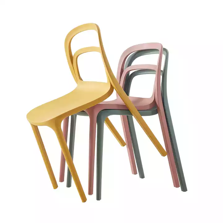 Creeu un espai de menjador exterior elegant amb una cadira de menjador apilable de plàstic